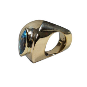 anello bronzo, oro e topazio azzurro