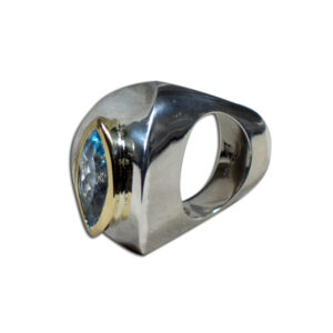 anello argento, oro e topazio azzurro